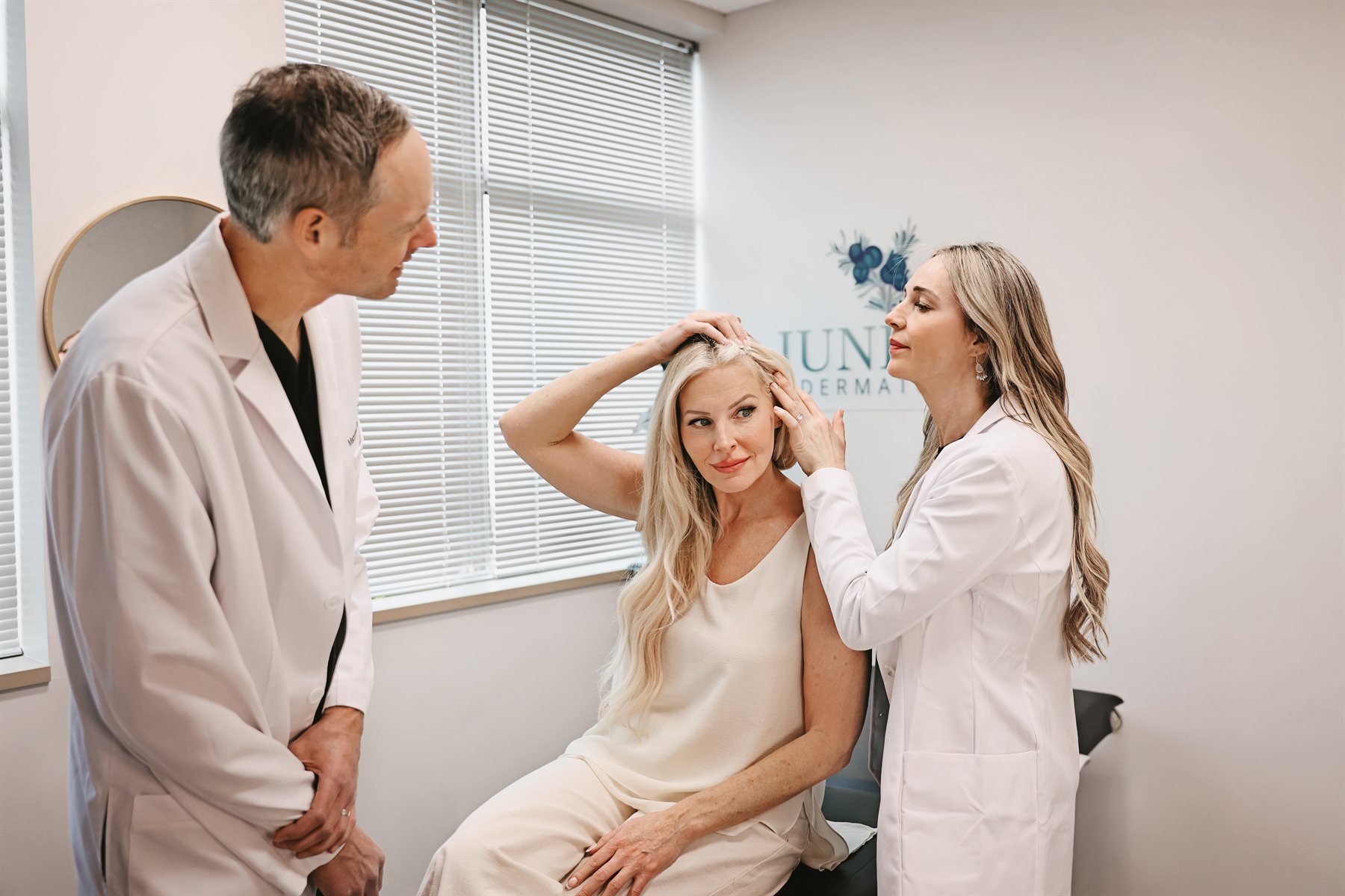 Juniper Dermatology clinicians examining a patient's scalp for dandruff and seborrheic dermatitis in Bend, Oregon