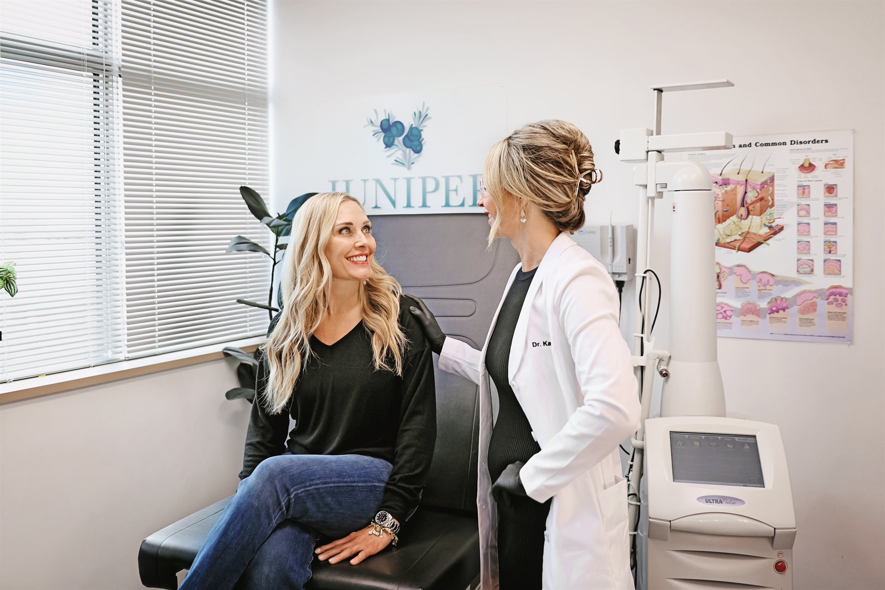 Dr. Pivik of Juniper Dermatology talking with a seated patient during a perioral dermatitis visit in Bend, Oregon