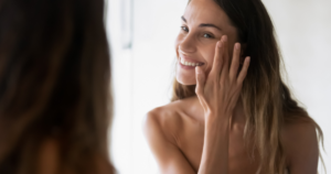 A woman doing her skincare routine.