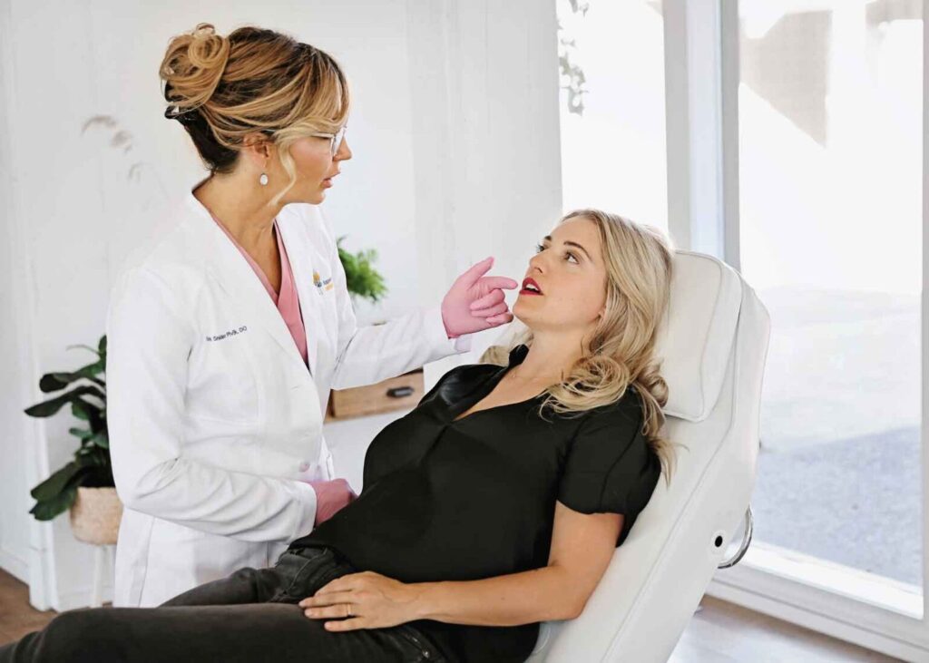 Dr. prepping patient for CO2 laser treatment in Bend, OR