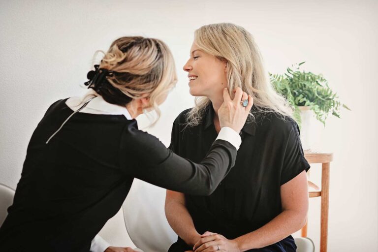 Dermatologist examining a patient for during a consultation in Bend, OR